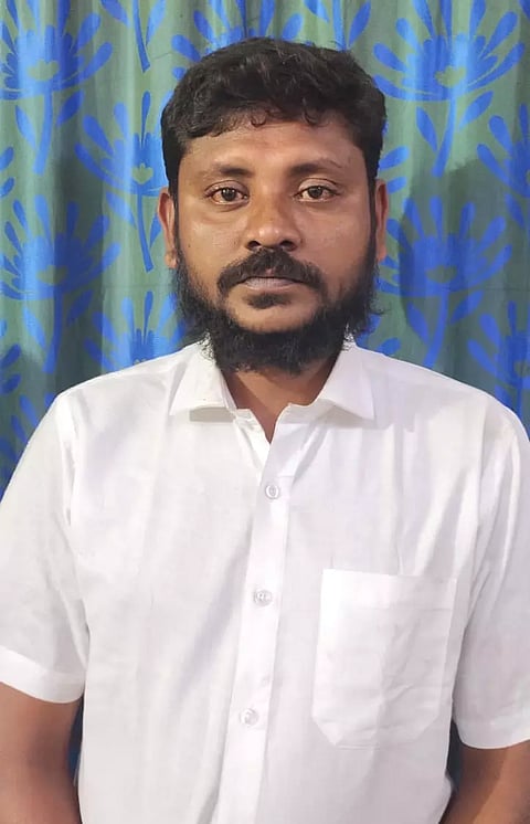 பெட்ரோல் ஊற்றி தீக்குளிக்க முயன்ற வாலிபர் சிறையில் அடைப்பு