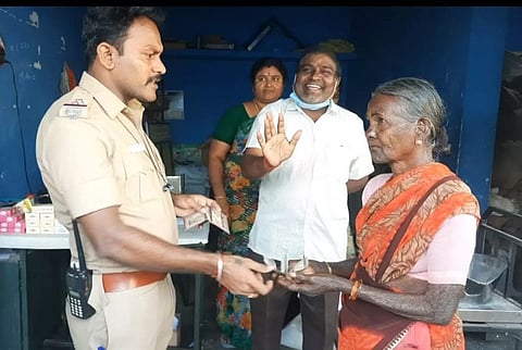 மூதாட்டிக்கு தனது சொந்த பணத்தில் ரூ.1000 வழங்கிய சப்-இன்ஸ்பெக்டர்