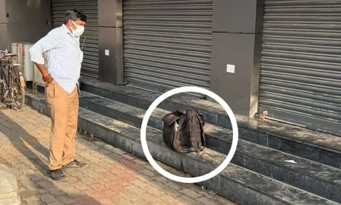 கடை முன்பு  கிடந்த மர்ம பையை படத்தில் காணலாம்.