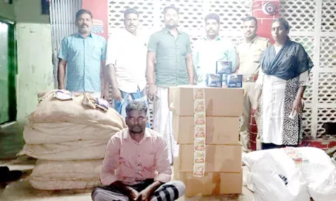 பறிமுதல் செய்யப்பட்ட புகையிலை பொருட்களுடன் கைது செய்யப்பட்டவர்.