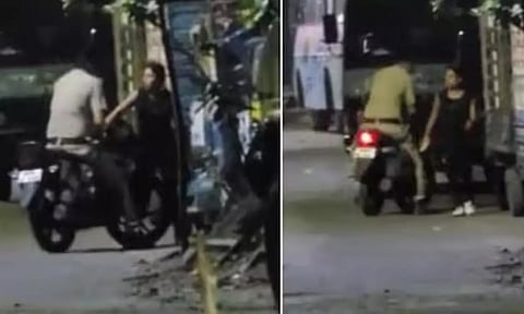 சாலையில் நடந்து சென்ற பெண்ணிடம் அத்துமீறிய போலீஸ்காரர்- வீடியோ வைரலானதால் சஸ்பெண்டு
