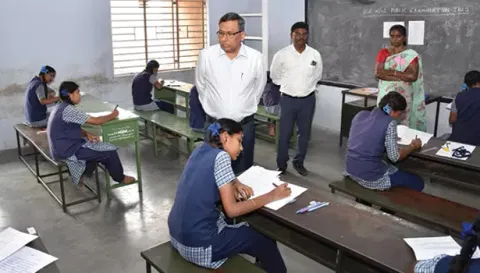 பிளஸ்-2 தேர்வு நடைபெறும் சேலம் அரசு கோட்டை மகளிர் மேல்நிலைப் பள்ளியில் கலெக்டர் கார்மேகம் ஆய்வு செய்த காட்சி.