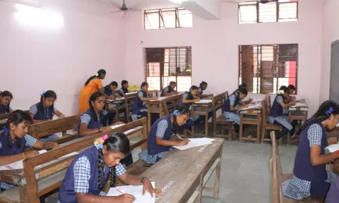 மீனாட்சிபுரம் பெண்கள் மேல்நிலைப்பள்ளியில் பிளஸ்-1 தேர்வு எழுதிய மாணவிகள்.
