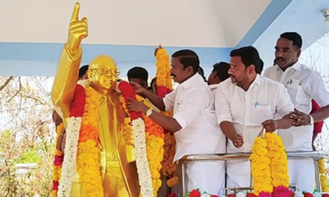 அம்பேத்கர் சிலைக்கு அ.தி.மு.க. சார்பில் மாலை அணிவித்து மரியாதை செலுத்தப்பட்டது.