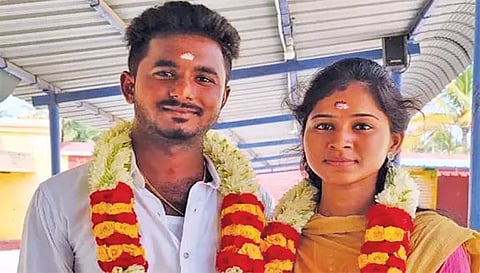 போலீசில் தஞ்சம் அடைந்த காதல் ஜோடி கவியரசன், கார்த்திகாவை படத்தில் காணலாம்.