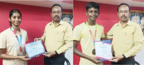சாதனை படைத்த மாணவ- மாணவிகளை பள்ளி முதல்வர் முருகவேள் பாராட்டி வாழ்த்து தெரிவித்த காட்சி.