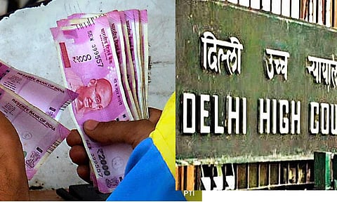 ரூ.2 ஆயிரம் நோட்டு வாபசுக்கு எதிரான பொதுநல மனு தள்ளுபடி- டெல்லி ஐகோர்ட் உத்தரவு