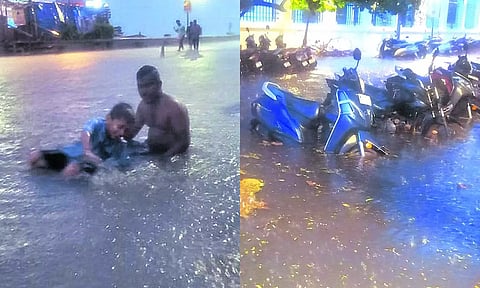 மழைநீரில் ஆனந்தமாக குளித்த காட்சி, பாரதி பூங்கா முன்பு வாகனங்களை மூழ்கடித்த வெள்ளம்.