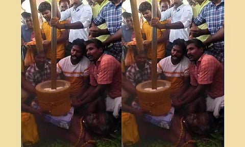 பக்தர் மார்பில் உரல் வைத்து உலக்கையால் அரிசி, மஞ்சள் இடிப்பு: குழந்தை இல்லாத பெண்களுக்கு வழங்கப்பட்டது