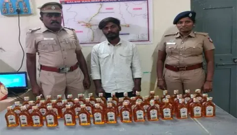 ரெயிலில் கடத்திய 48 மது பாட்டில்கள் பறிமுதல்