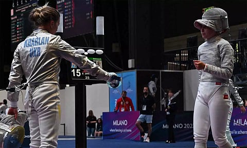 ரஷிய வீராங்கனையுடன் கைகுலுக்க மறுத்ததால் தகுதி நீக்கம் செய்யப்பட்ட உக்ரைன் வீராங்கனை