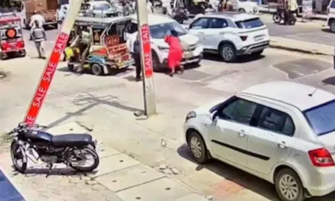 பட்டப்பகலில் பயங்கரம்.. கார் பொனெட்டில் இழுத்து செல்லப்பட்ட பெண்.. பரபரப்பு வீடியோ!