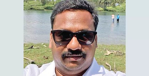 புதுச்சேரி காமாட்சியம்மன் கோவில் ரூ.50 கோடி நில மோசடி வழக்கில் அதிகாரி கைது