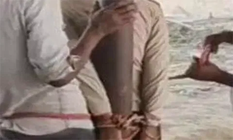 வட மாநில வாலிபரை கம்பத்தில் கட்டி வைத்த பொதுமக்கள்