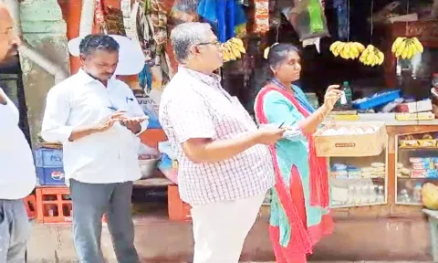 அதிகாரிகள் பெட்டிக்கடையில் ேசாதனை செய்த காட்சி.