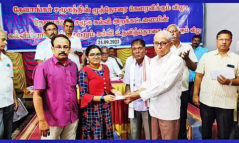 விழாவில் மாணவிக்கு கல்வி உதவித்தொகை வழங்கிய காட்சி.