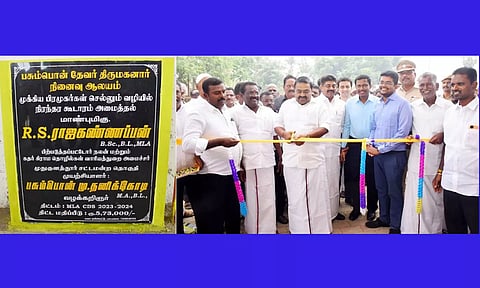 பசும்பொன் முத்தராமலிங்க தேவர் நினைவிடத்தில் முக்கிய பிரமுகர்கள் செல்லும் வழியில் கட்டப்பட்டுள்ள நுழைவு வாயிலை அமைச்சர் ராஜகண்ணப்பன் திறந்துவைத்த காட்சி. அருகில் கலெக்டர் விஷ்ணுசந்திரன், எம்.எல்.ஏ.க்கள் காதர்பாட்ஷா முத்துராமலிங்கம், முருகேசன் மற்றும் பலர் உள்ளனர்.