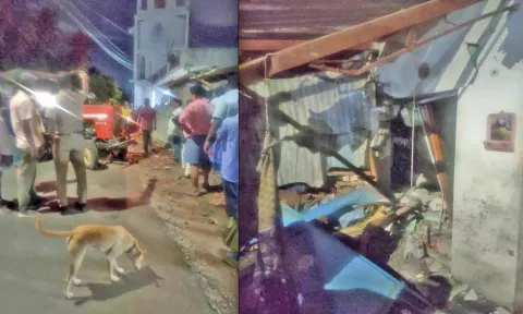 &nbsp;வீட்டின் சுவர் - மேற்கூரை இடிந்திருப்பதையும் விபத்து ஏற்படுத்திய டிராக்டரையும் படத்தில் காணலாம்.