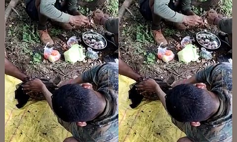 அதிவிரைவு படையினர் ஆமையின் கழுத்தை அறுக்கும் காட்சி.