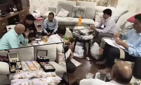 அரசு அதிகாரி வீட்டில் கட்டு கட்டாக பணம், தங்க கட்டிகள் பறிமுதல்
