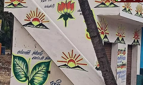 ஆம்பூர் : ஒரே கட்டிடத்தில்  வரையப்பட்ட அனைத்து கட்சியின் சின்னங்கள்