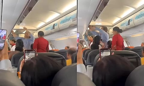 விமானத்தின் எகனாமி கிளாசில் எளிமையாக பயணித்த டோனி... வைரலாகும் வீடியோ