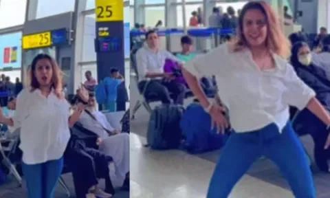 விமான நிலையத்தில் குத்தாட்டம் போட்ட பெண்- வீடியோ