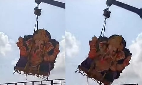 கிரேன் மூலம் தூக்கியபோது எடை தாங்காமல் கீழே விழுந்து உடைந்த விநாயகர் சிலை- கடற்கரையில் பரபரப்பு