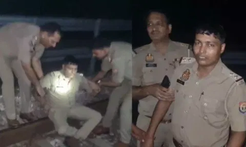 நீதிபதி திட்டியதால் ரெயில்வே டிராக்கில் அமர்ந்து தற்கொலைக்கு முயன்ற சப் இன்ஸ்பெக்டர் - வீடியோ