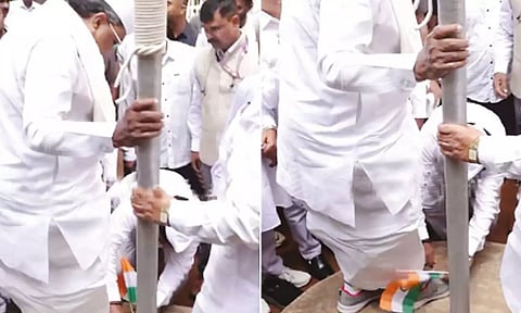 தேசிய கொடியுடன் சித்தராமையாவின் 'ஷூ'வை கழற்றிய காங்கிரஸ் தொண்டர்