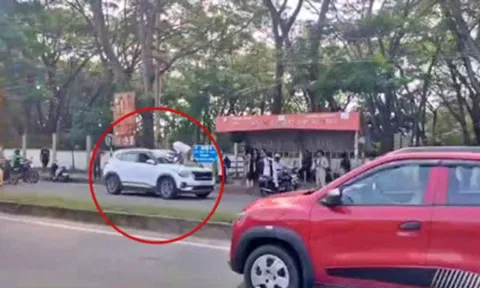 கர்நாடகாவில் பேனட்டில் தொங்கியபடி போலீஸ்காரரை இழுத்து சென்ற கார்