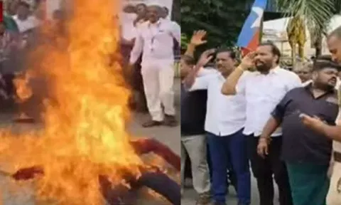 மத்திய அமைச்சர் அமித்ஷா உருவ பொம்மையை எரித்து விசிகவினர் போராட்டம்