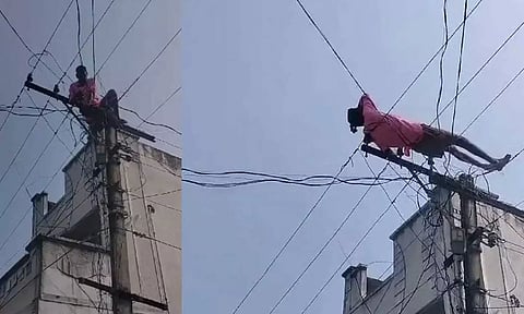 VIDEO: குடிபோதையில் மின்கம்பத்தில் ஏறி படுத்துக்கொண்ட இளைஞர்