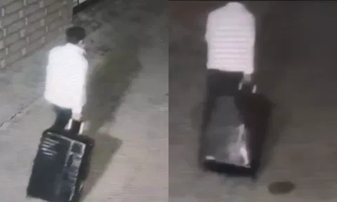 காங்கிரஸ் பிரமுகர் உடலை சூட்கேசில் வைத்து இழுத்துச் செல்லும் கொலையாளி - அதிர்ச்சி வீடியோ