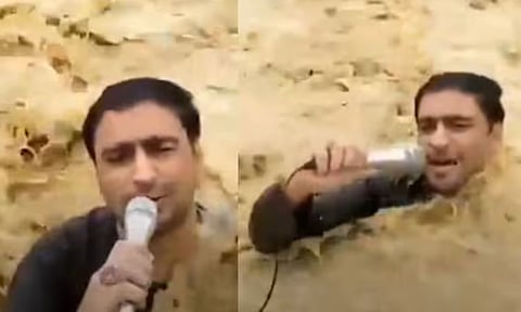 VIDEO: வெள்ளத்தில் நின்றபடி நேரலையில் பேசிய பத்திரிகையாளர் தண்ணீரில் அடித்துச் செல்லப்பட்ட விபரீதம்