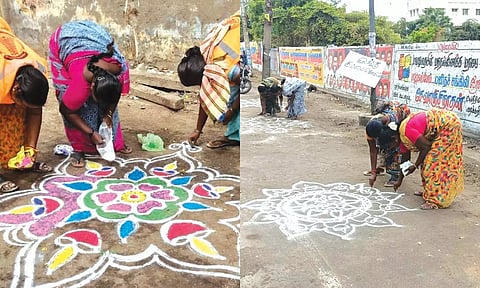 மாநகராட்சி தூய்மை பணியாளர்கள் கோலமிடும் காட்சி