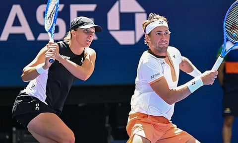 அமெரிக்க ஓபன் டென்னிஸ்: கலப்பு இரட்டையரில் அரையிறுதிக்கு முன்னேறிய இகா ஸ்வியாடெக் ஜோடி