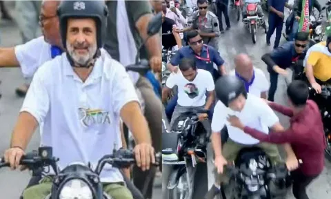 பேரணியில் ராகுல் காந்தியை முத்தமிட்ட இளைஞரை தாக்கிய பாதுகாப்பு அதிகாரி - வீடியோ வைரல்