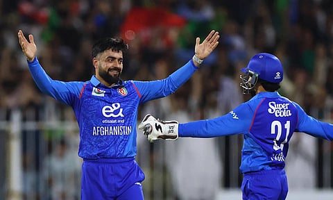 சர்வதேச டி20 கிரிக்கெட்டில் அதிக விக்கெட்டுகள் - வரலாற்று சாதனை படைத்த ரசீத் கான்