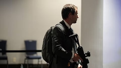 A law enforcement officer responds following reports of a shooting