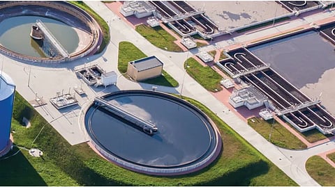 High-angle view of industrial water treatment infrastructure, representing the ₹259 crore AMRUT 2.0 upgrades in Varanasi.
