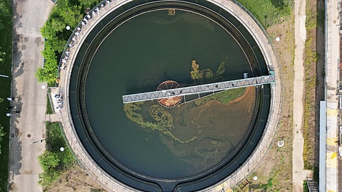 Aerial view of a circular primary clarifier at an industrial ETP used for wastewater clarification before RO pretreatment and water reuse.