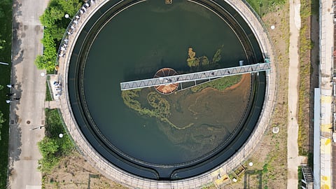Aerial view of a circular primary clarifier at an industrial ETP used for wastewater clarification before RO pretreatment and water reuse.