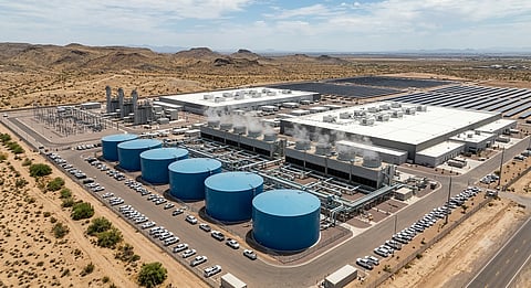 Large industrial water storage tanks and evaporative cooling infrastructure at an artificial intelligence data center campus located in a dry desert region.