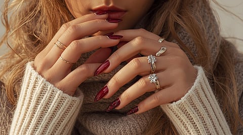 Nail trends bring together moody reds, frosted whites, modern French tips and subtle metallic accents, perfect for festive Indian winters and everyday glam.