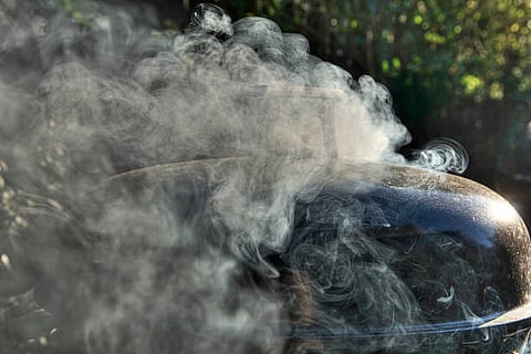 If you cook at very high temperatures, particularly foods containing oil or marinades, the oil can start to burn and produce smoke.  