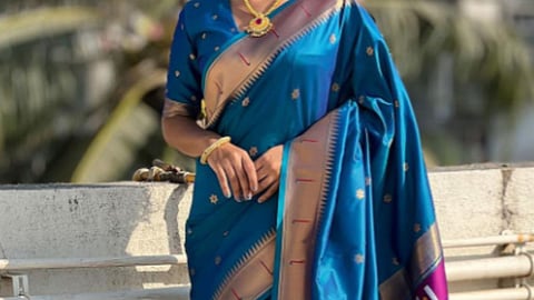 Add a festive touch to your closet with a Paithani saree.