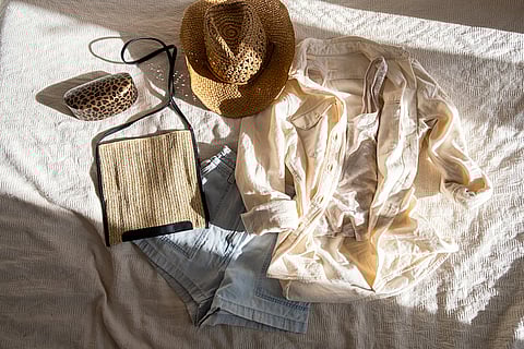 Linen Shirt Flatlay along with a cotton denim shorts.