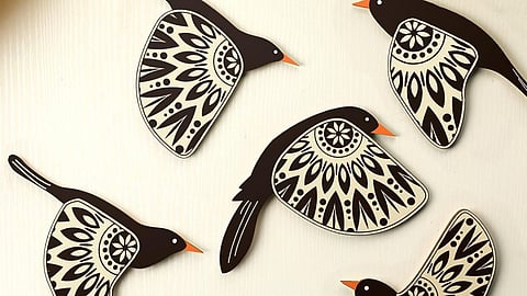 Create a serene balcony retreat with greenery, comfy seating, decorative accents, and ambient lighting.