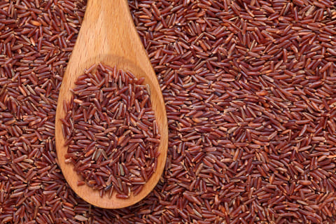 Include red rice in your daily diet for its many health benefits.